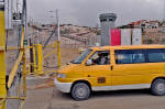 Palestinian Taxi crossing the security fence 34460002-w.jpg